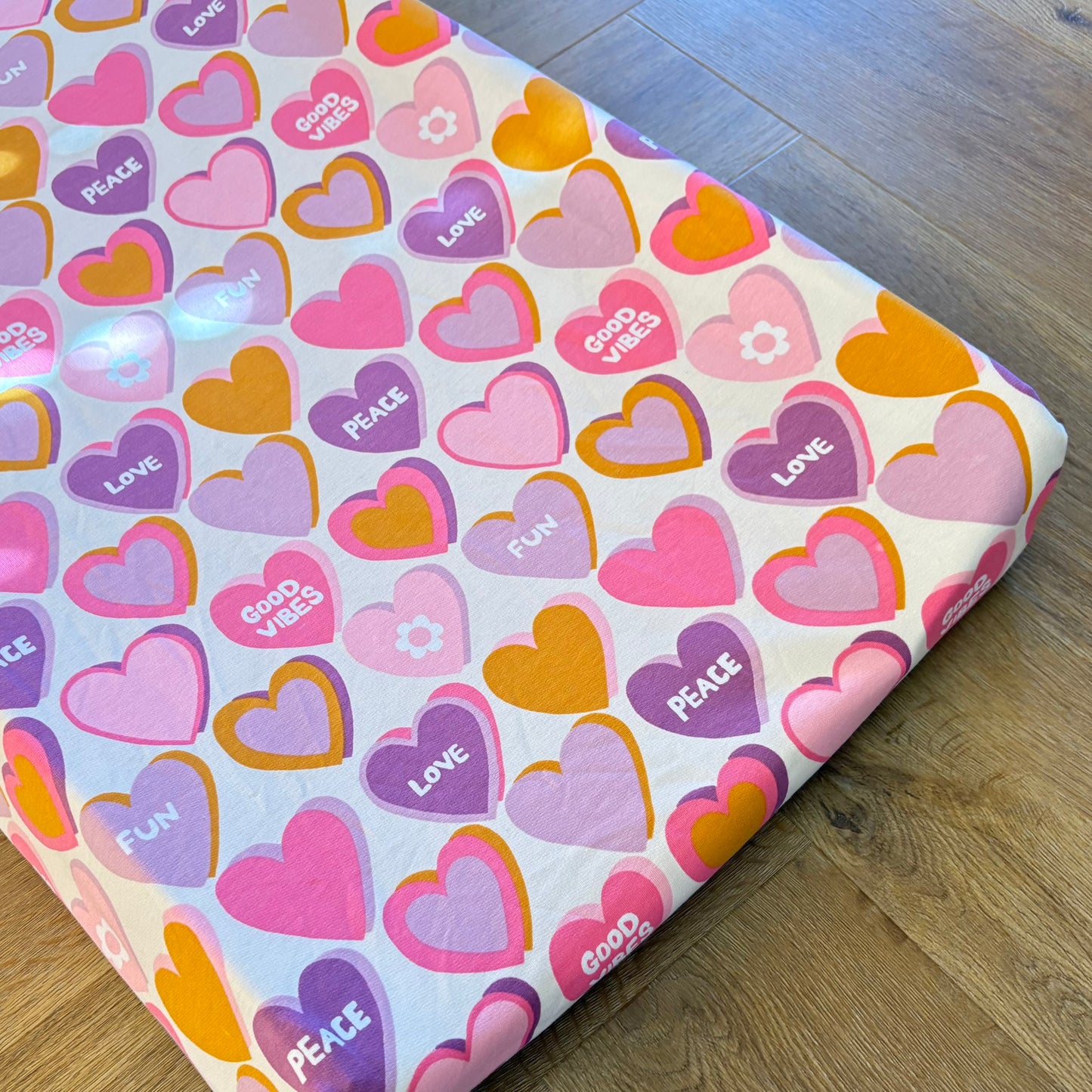 Aankleedkussenhoes - hartjes - roze/paars/oker